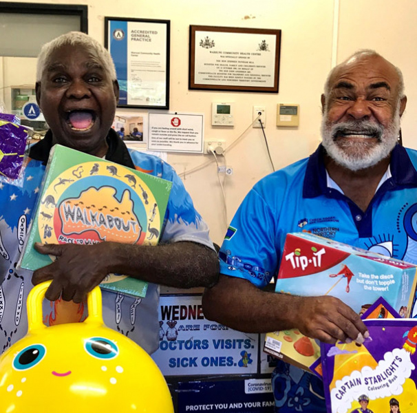 Douglas and Eda at the Warruwi Clinic, NT, receiving their Starlight goodies pack