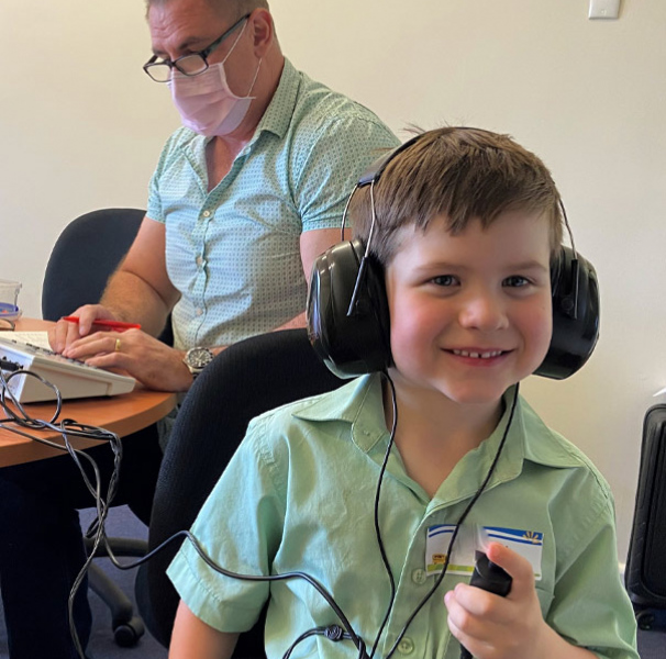 Five-year-old AJ from the Parkes Shire having just had his hearing tested.