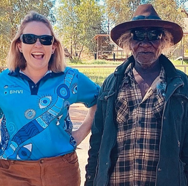 Optometrist Sarah with Ronnie, Peter and Johnny in Laramba community after COVID-19 vaccinations and eye tests.