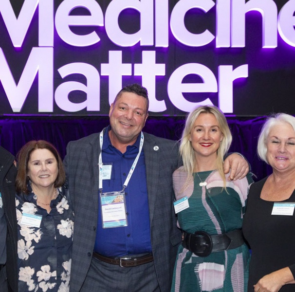 David Lockwood (centre) and other delegates at a Medicines Australia event in 2021, at which he shared his story.