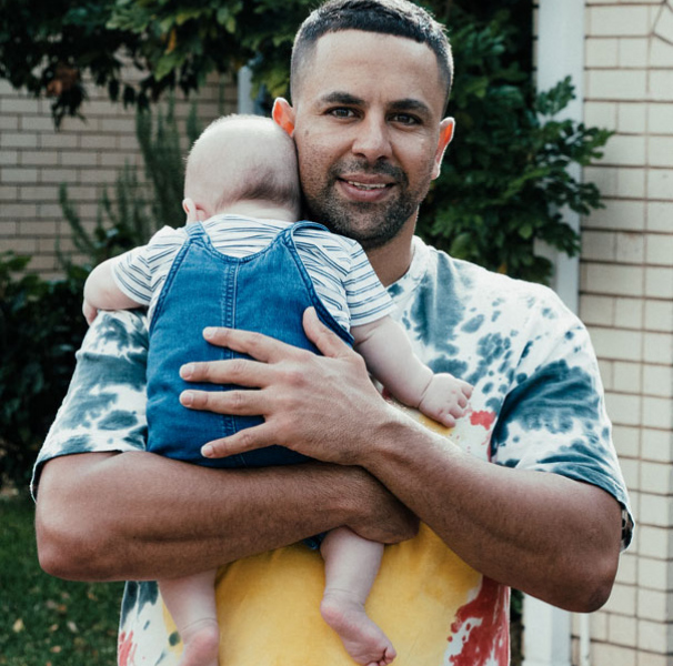 Man with young baby