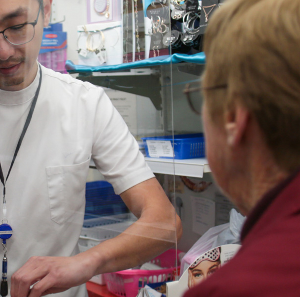 Pharmacist with customer
