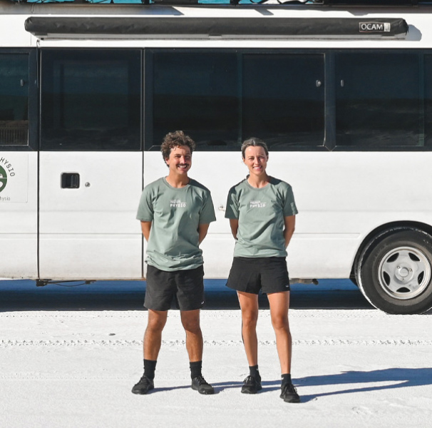Clare and David – physiotherapists in front of their bus