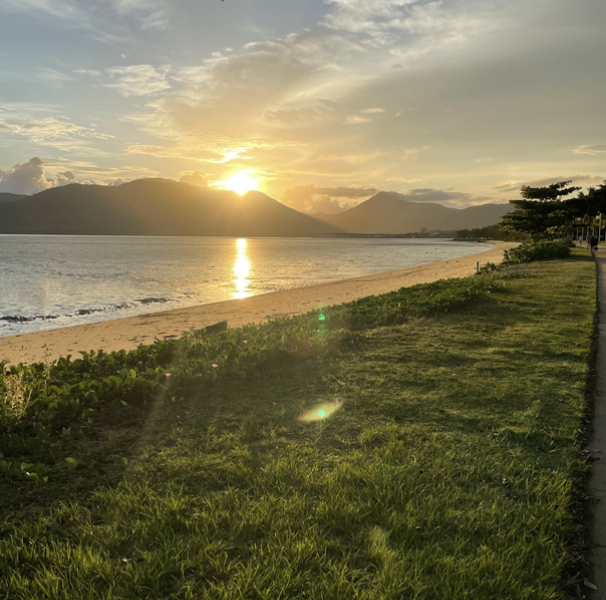 Queensland sunset over a grassy beach