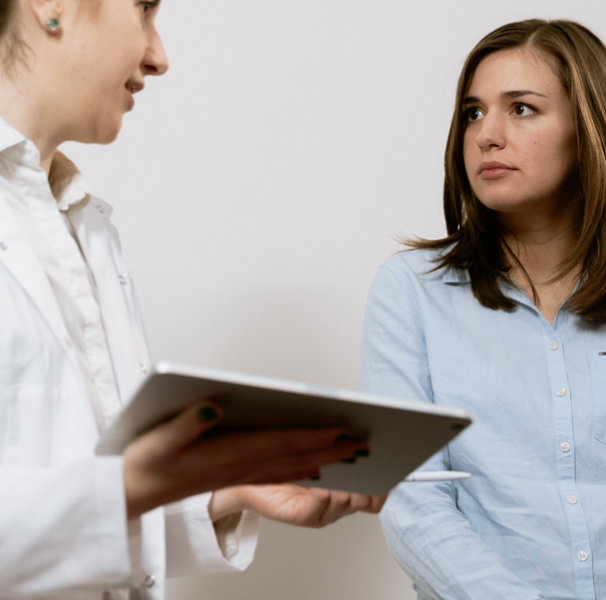Female Dr talking to female patient