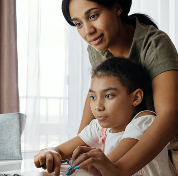 Mother and daughter on laptop