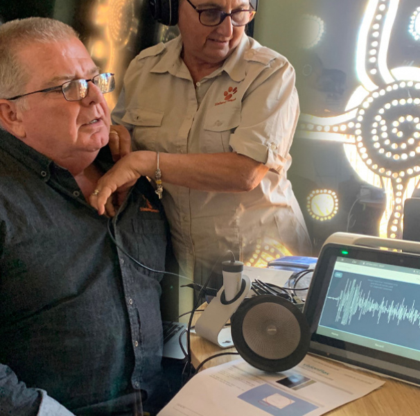 Woman and man using digital stethoscope
