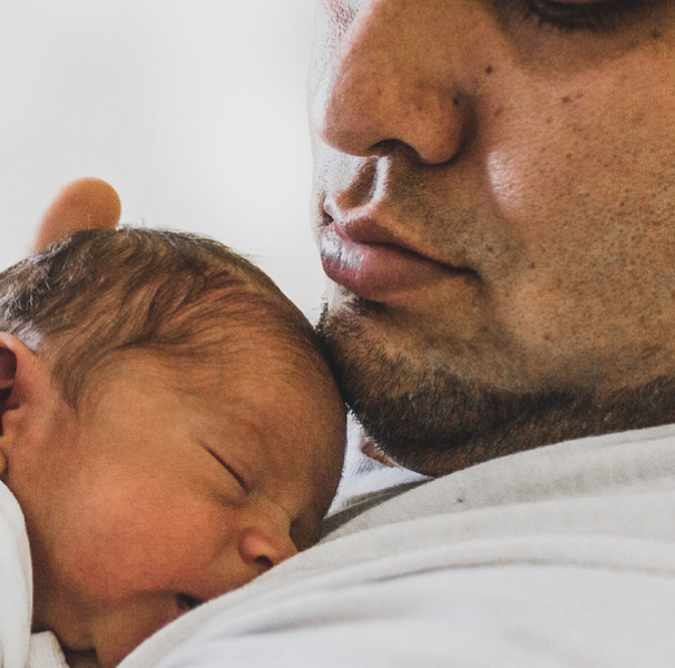 Father with young baby. 