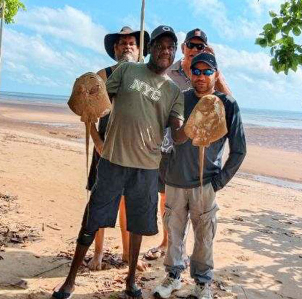 Wayne Lalara (front left), Peter Henwood (back left), David Croker (back right) and Neil Wilkshire (front right) fishing at Buffalo Creek.