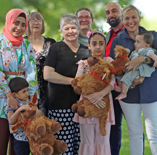Glen Innes committee with new doctor and family.