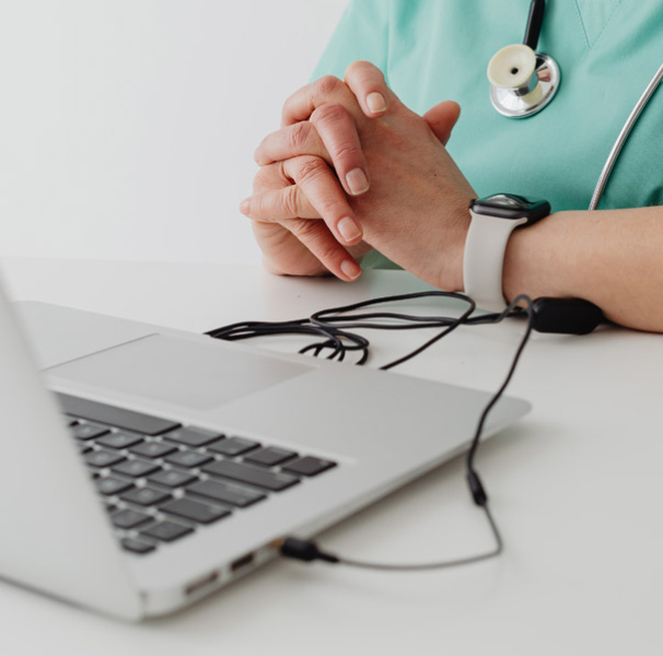 Medical professional using laptop