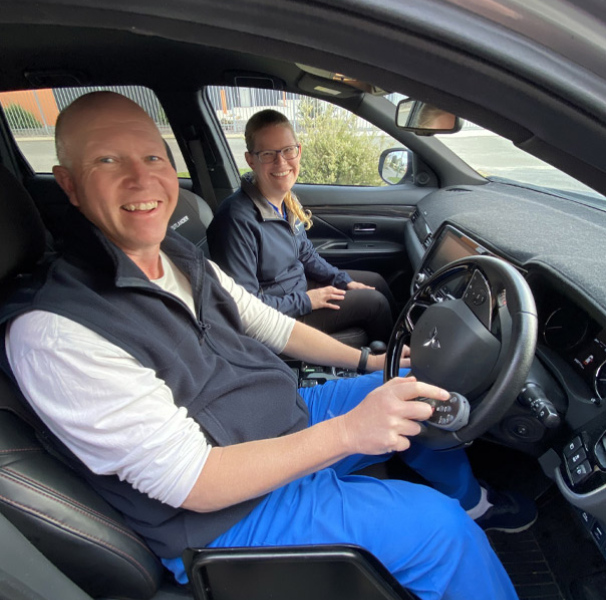 Driver-Trained Occupational Therapist Emma Tozana and a client using a modified vehicle.