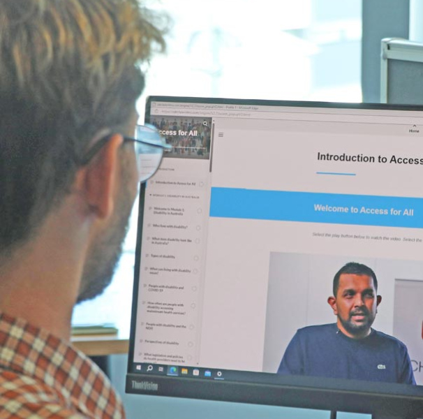 Man using computer to use Access for All