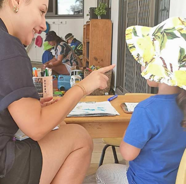 Female team member with young kindergarten child