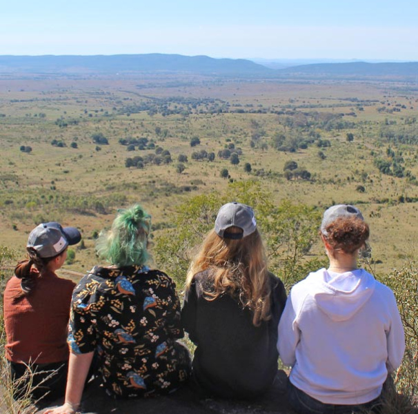 Jasmine Teoh, Liz Schultz, Isabella Beattie and Amelia Bofinger from GROW Rural Central Queensland in July 2023, on Country at Flagstaff Hill.