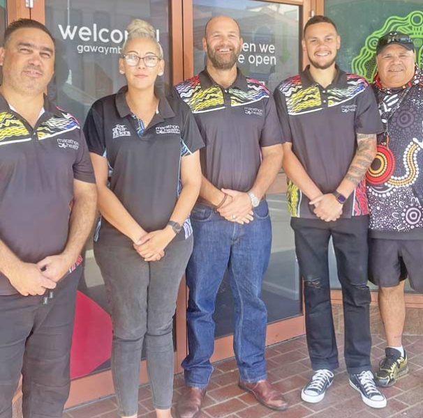 Image: Left to right: Brendan Cubby – Acting Program Manager Youth Outreach Project, Brenda Duncan – Community Engagement Officer, Tim Carr – Training and Engagement Officer, Travis Hill – Community Engagement Officer, Max Hill – Community Engagement Officer. 