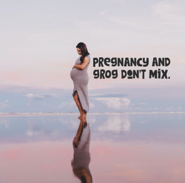 (Victorian ACCHO, Dhauwurd-Wurrung Elderly and Community Health Service’s local application of the Strong Born Campaign). Large banner with mother and child saying Strong Born pregnancy and grog dont mix