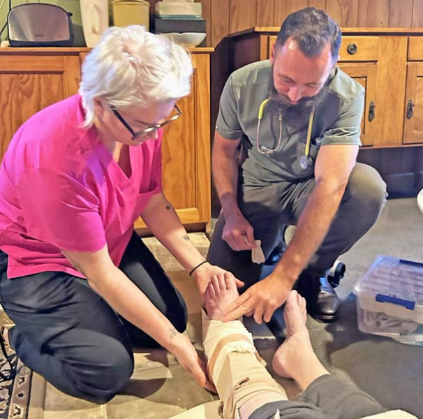 Ben Smith, paramedic, with nurse practitioner and anonymous patient.