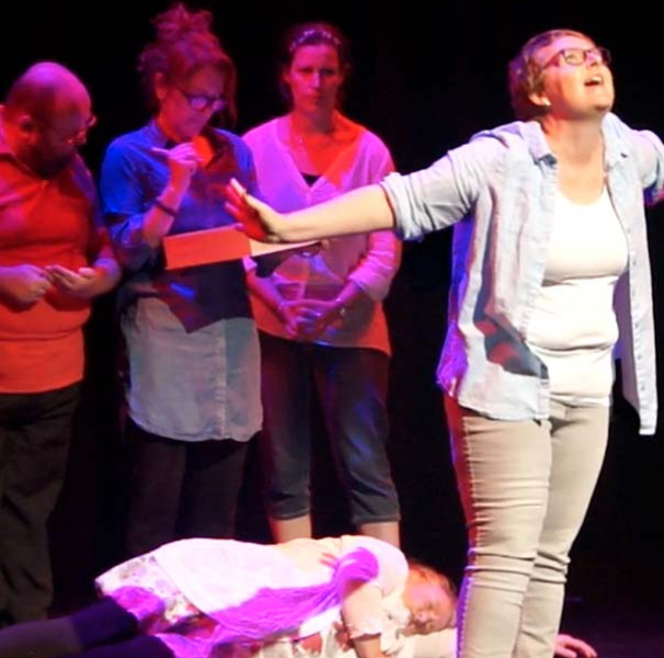 Actors performing on stage