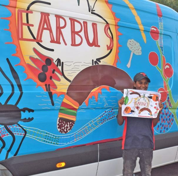 Artist Fabian with original Goldfields bus art