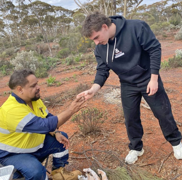 Traditional cooking and eating of Kangaroo tails on Country