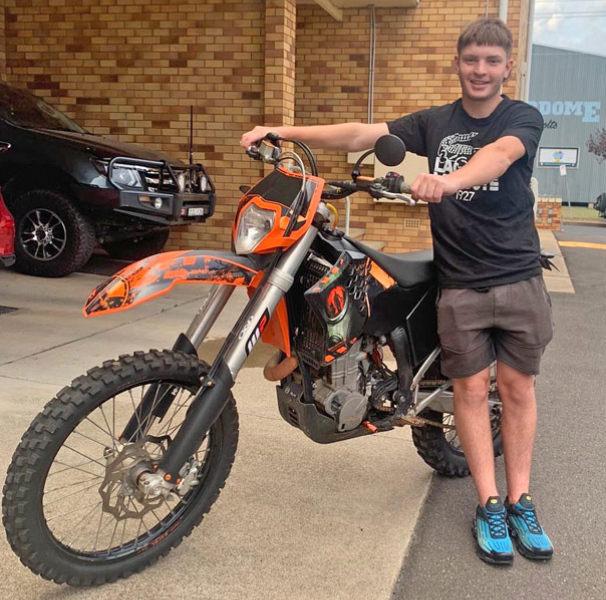 Shannon with his new trail motorbike.
